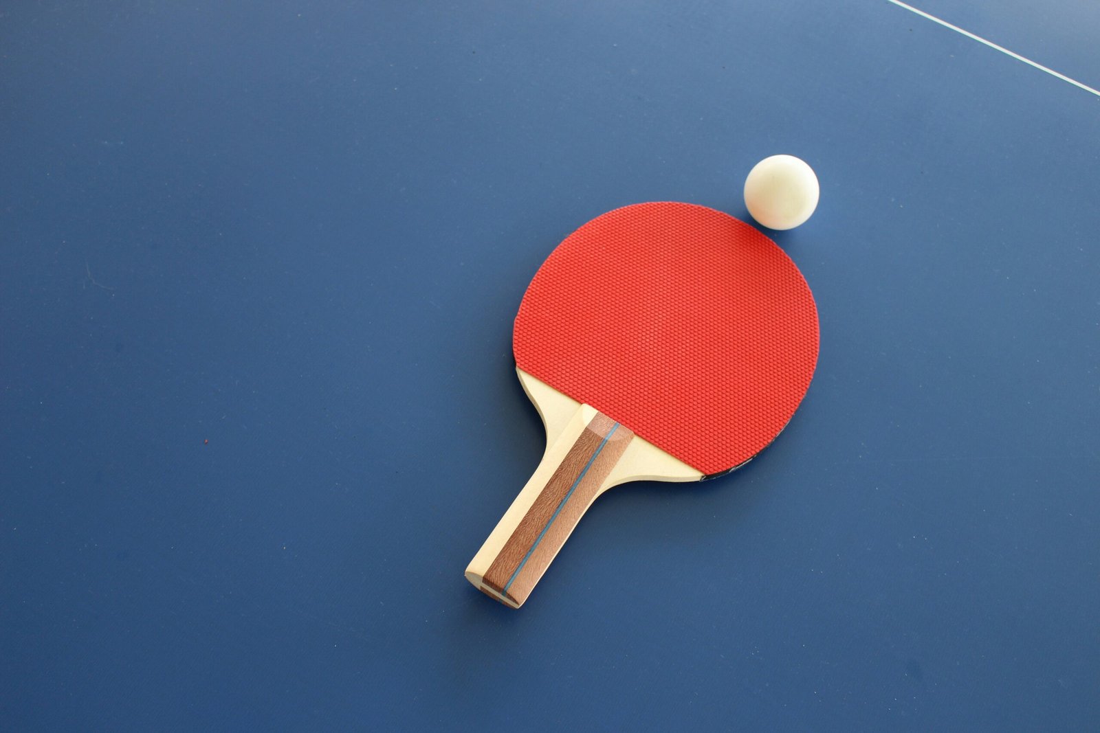 O tênis de mesa em Foto de Lisa Keffer na Unsplash